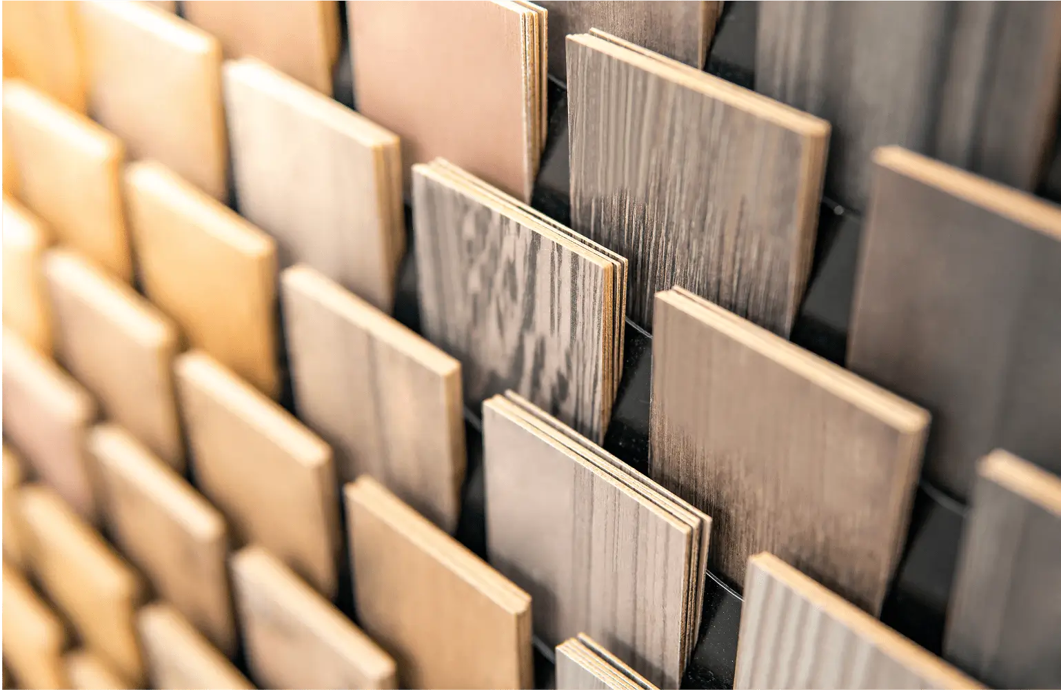 Wooden tile samples in various shades.